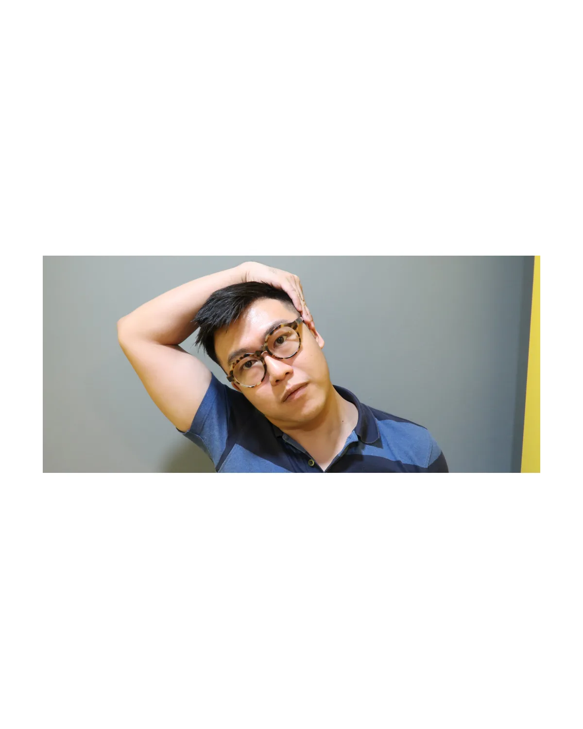 Person doing a gentle standing neck stretch for stress-linked tension