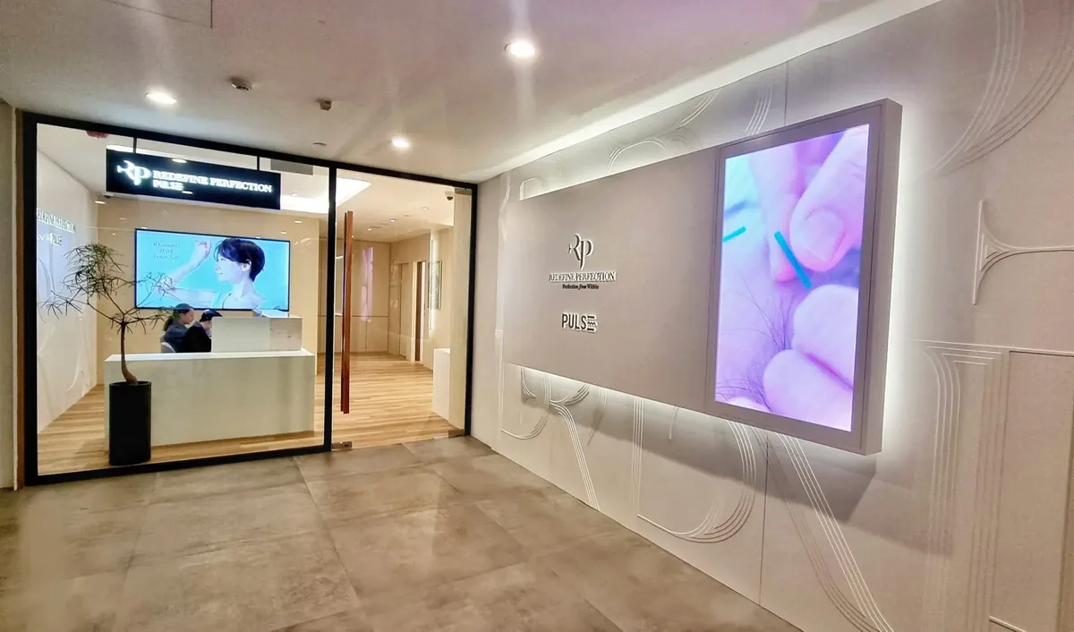Redefine Perfection and PULSE TCM aesthetics clinic entrance at Tang Plaza, Orchard